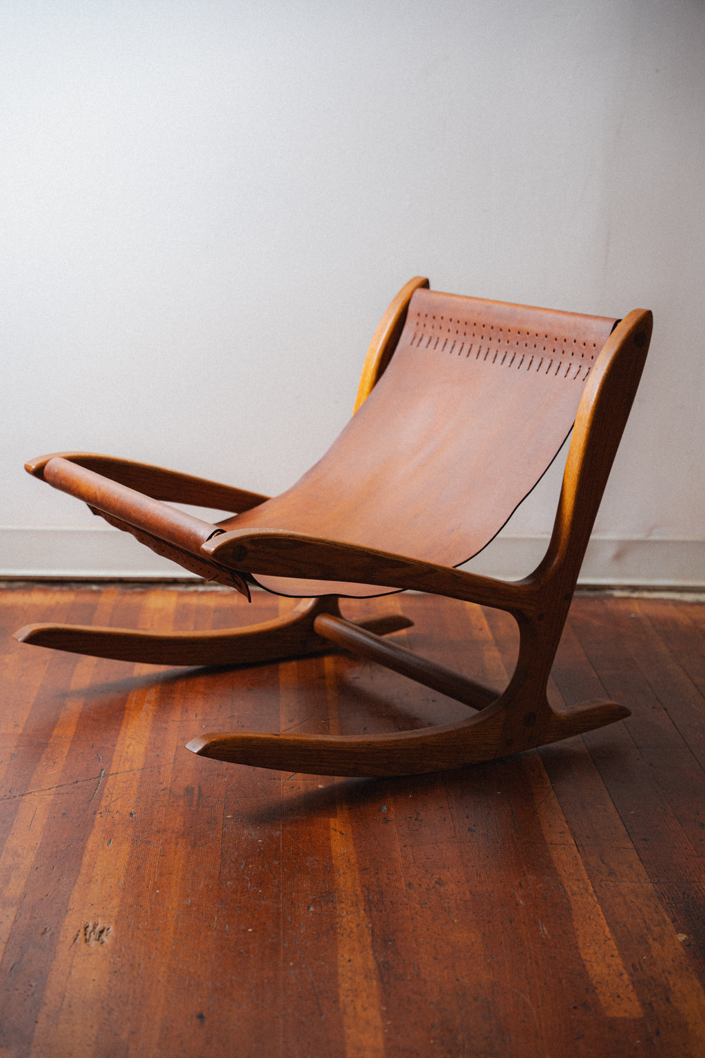 Studio Oak and Leather Hide Lounge Chair by Norman Ridenour