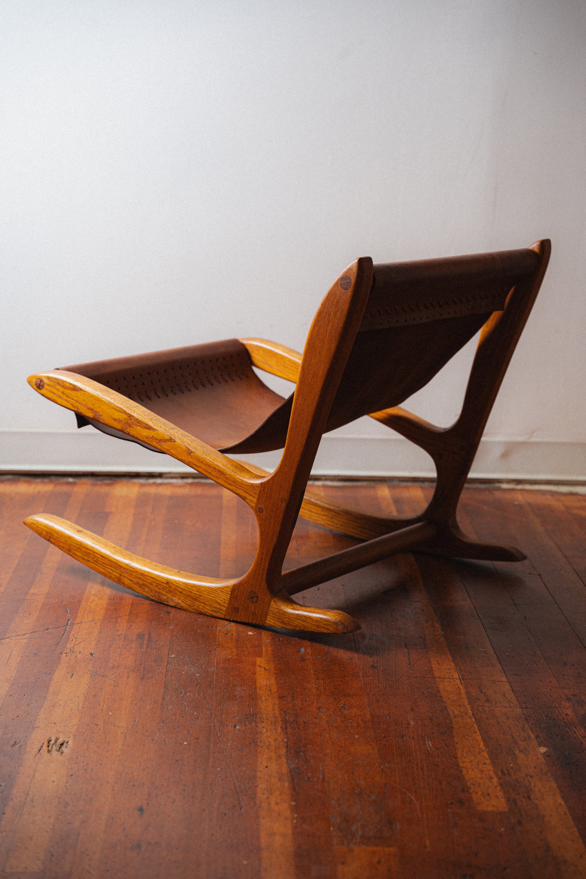 Studio Oak and Leather Hide Lounge Chair by Norman Ridenour