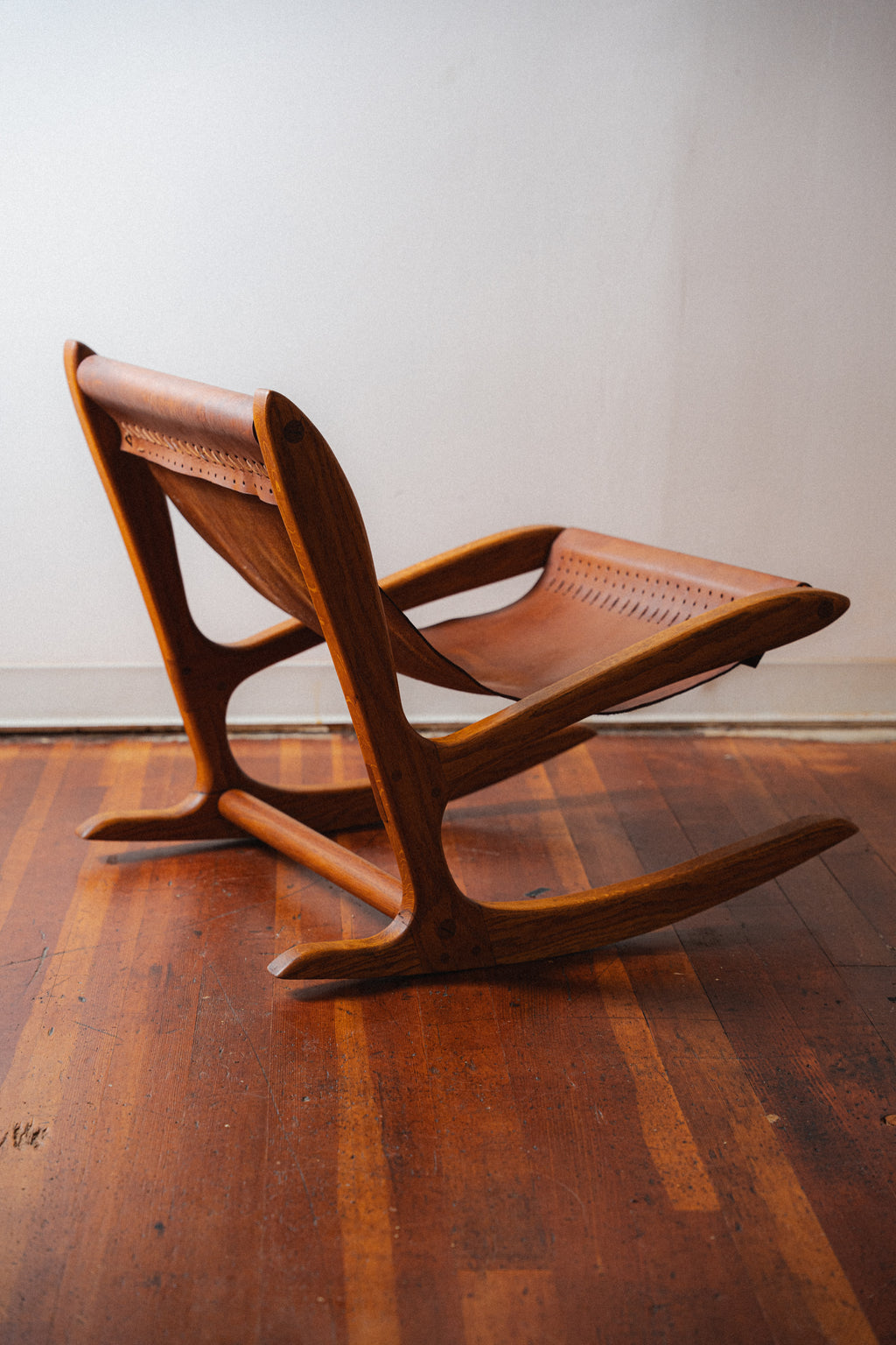 Studio Oak and Leather Hide Lounge Chair by Norman Ridenour