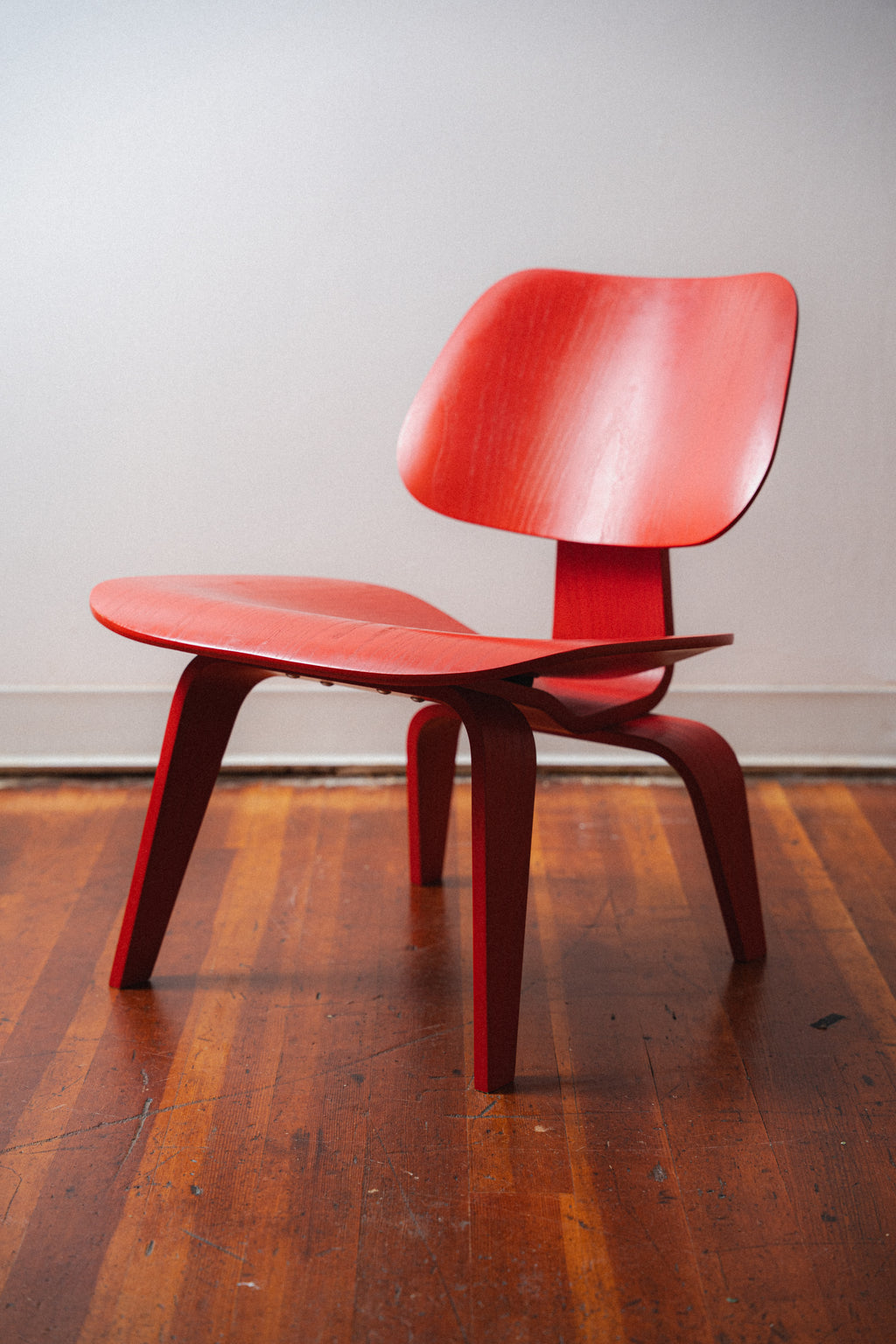 Red Eames LCW by Charles and Ray Eames for Herman Miller