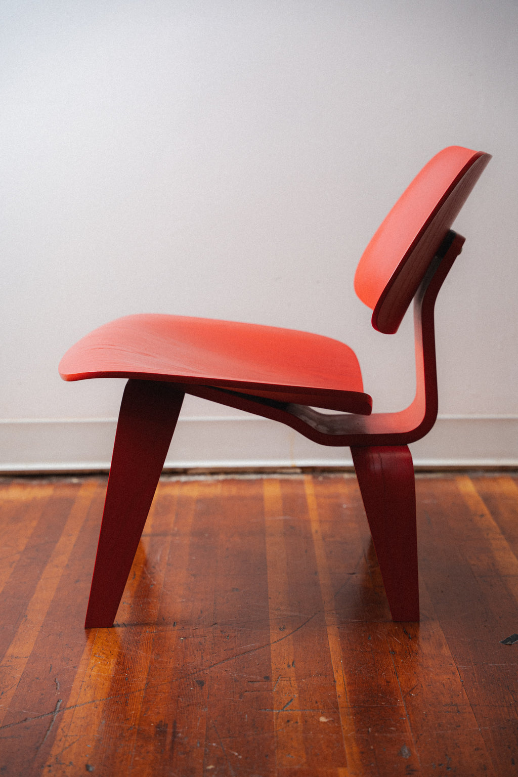 Red Eames LCW by Charles and Ray Eames for Herman Miller