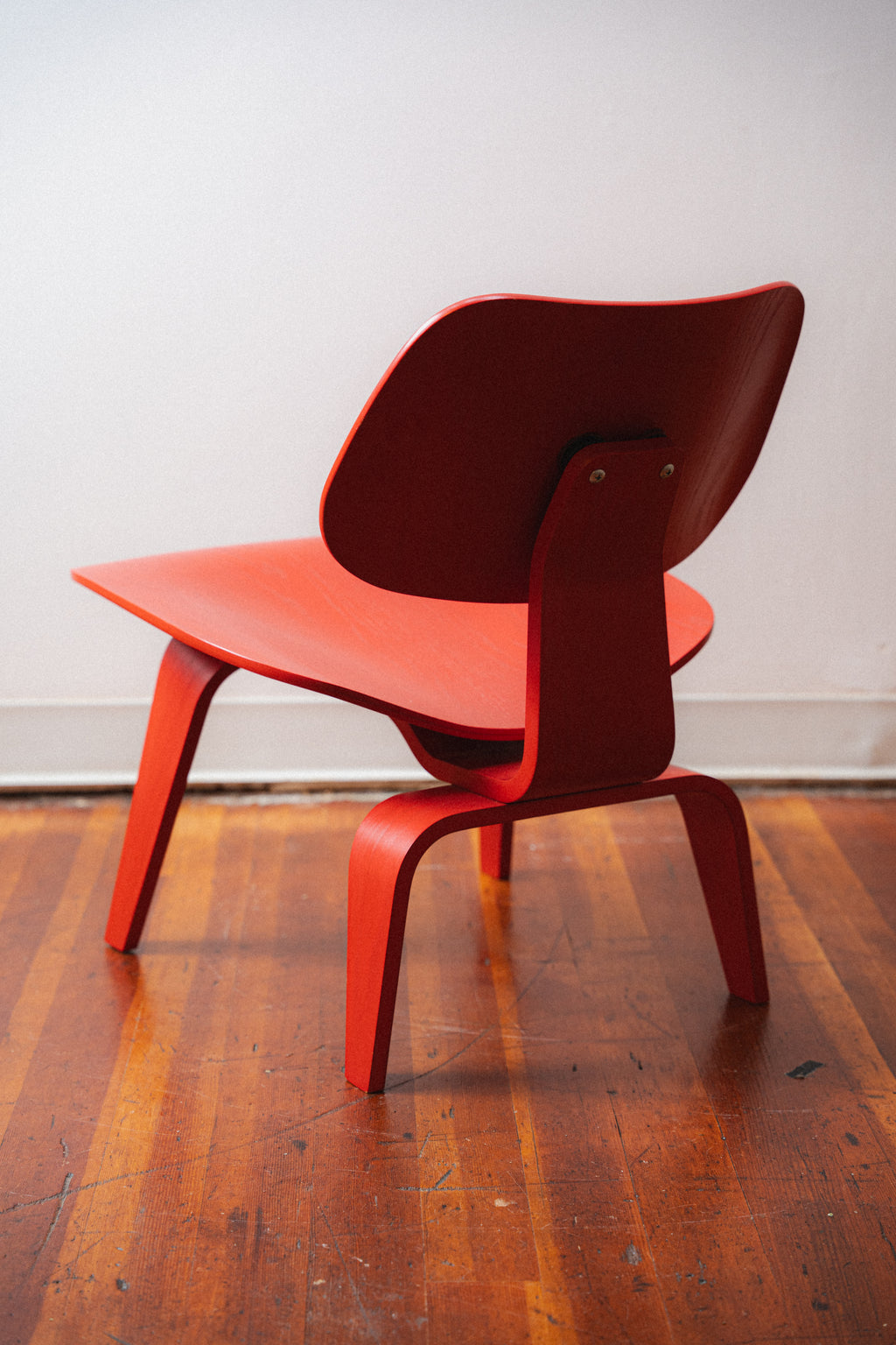 Red Eames LCW by Charles and Ray Eames for Herman Miller