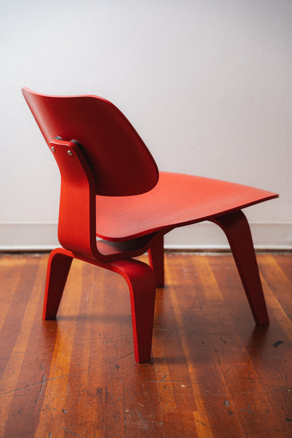 Red Eames LCW by Charles and Ray Eames for Herman Miller