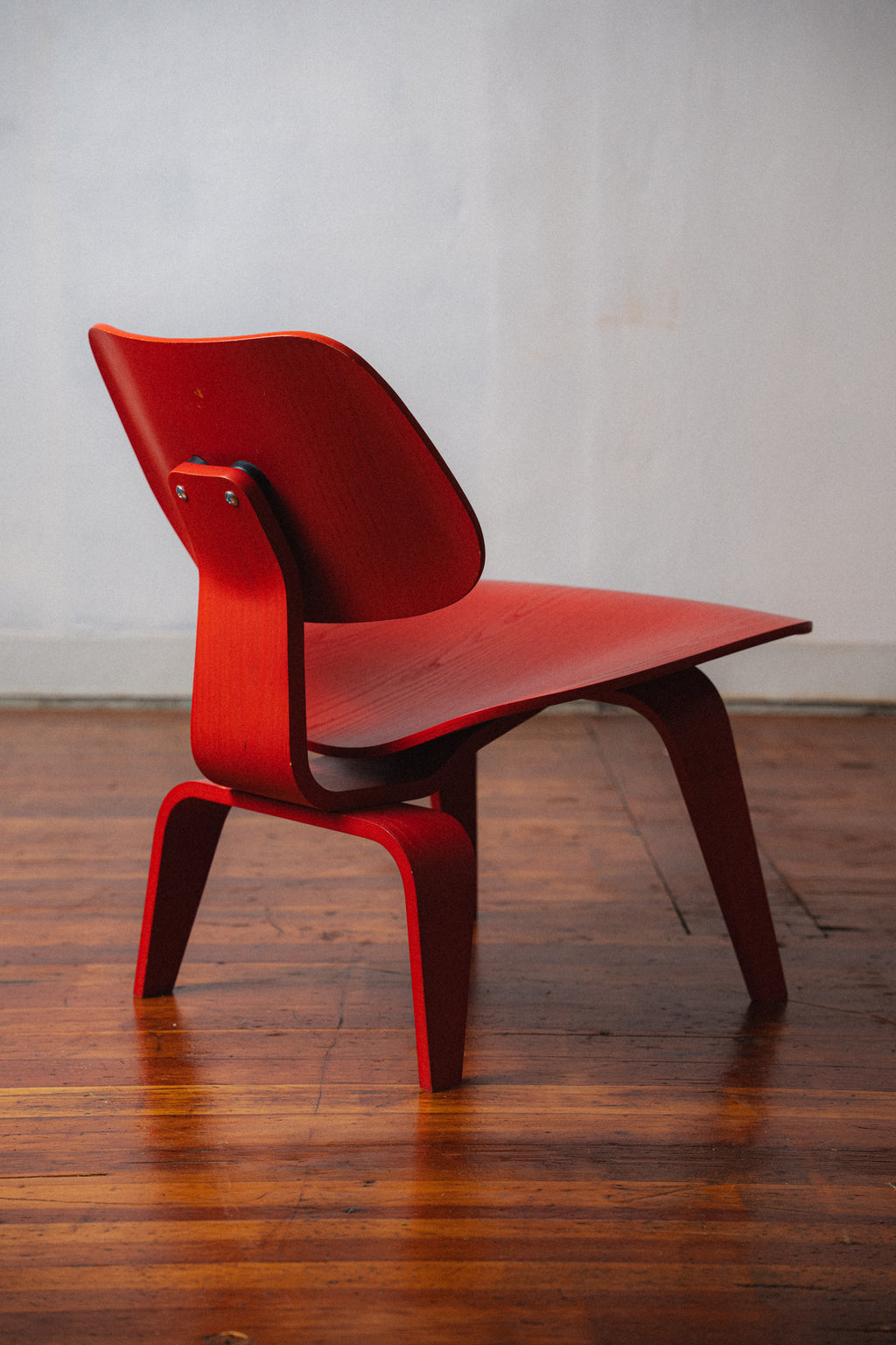 Red Eames LCW by Charles and Ray Eames for Herman Miller