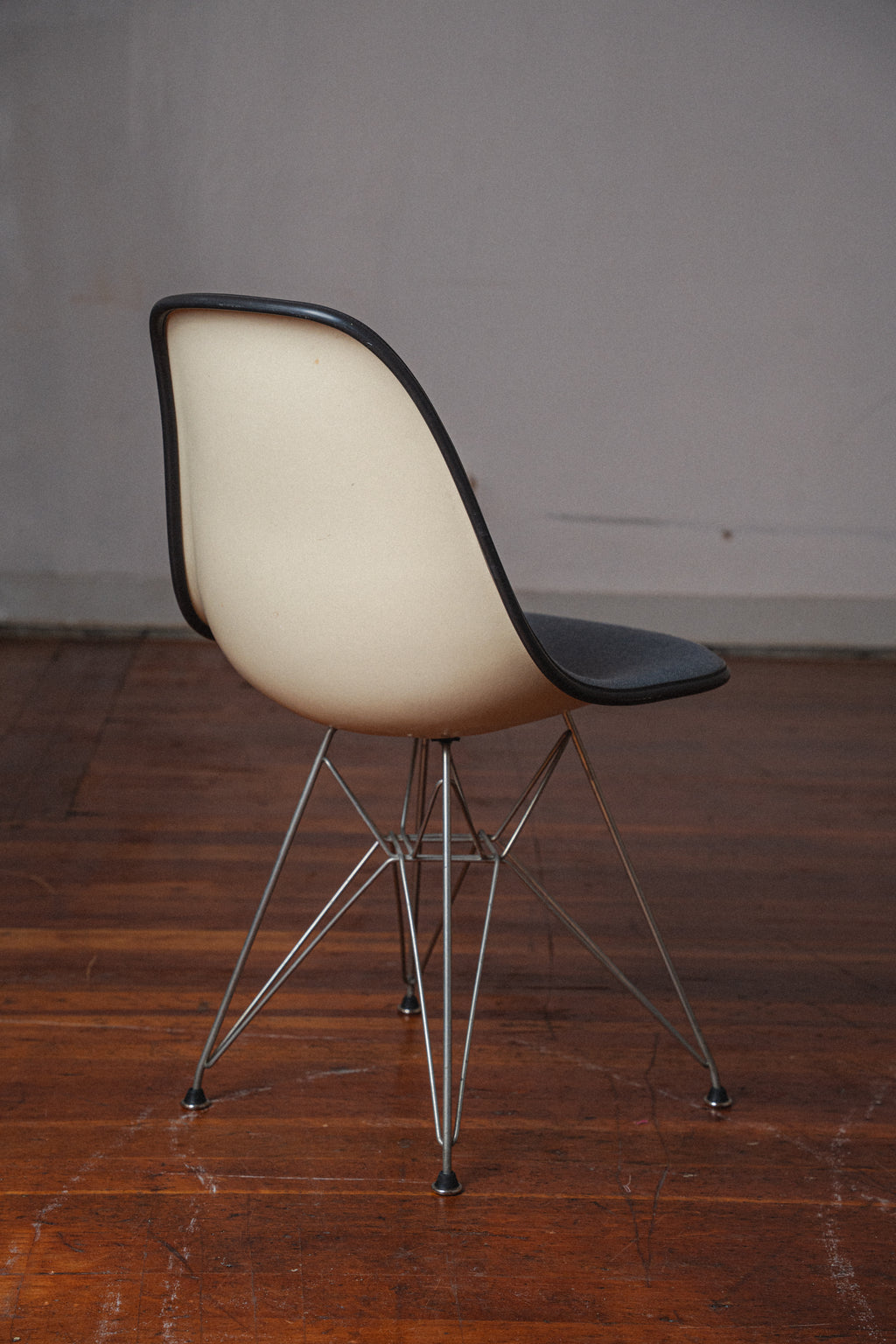 Eames Molded Fiberglass Chairs, Upholstered, by Charles and Ray Eames for Herman Miller