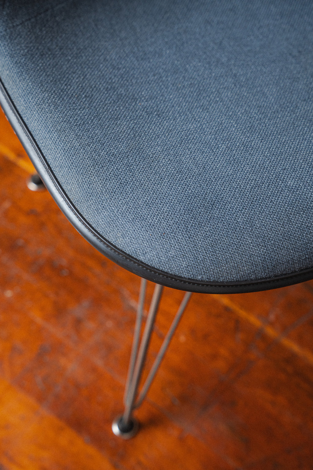 Eames Molded Fiberglass Chairs, Upholstered, by Charles and Ray Eames for Herman Miller