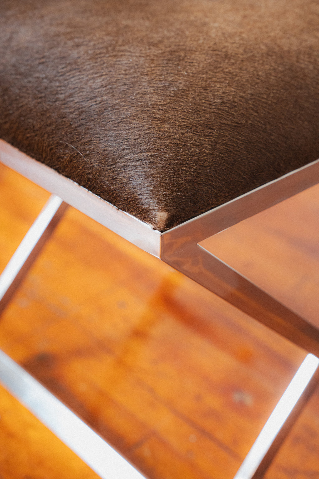 Chromed Steel & Cowhide Footstool