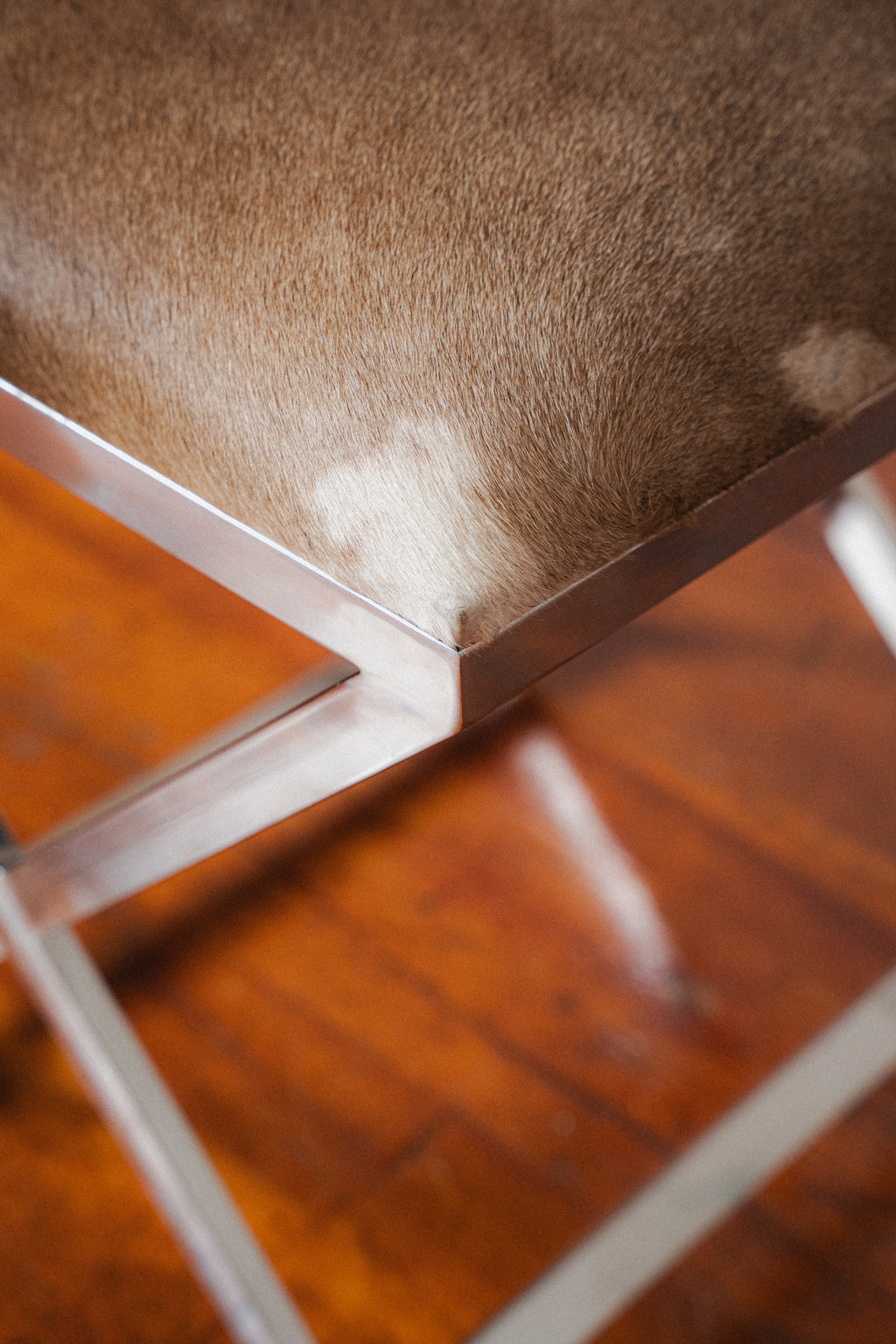 Chromed Steel & Cowhide Footstool